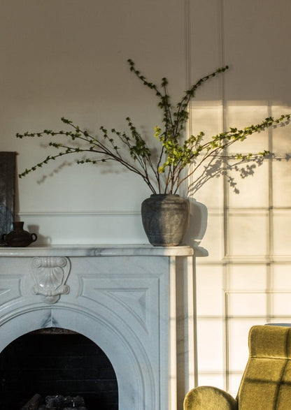 Green Budding Fake Spring Branch in Concrete Vase