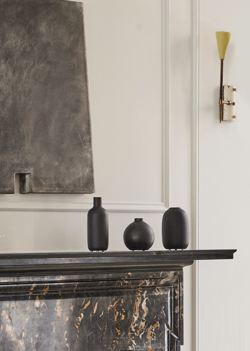 Small Black Bud Vases Styled on Mantel