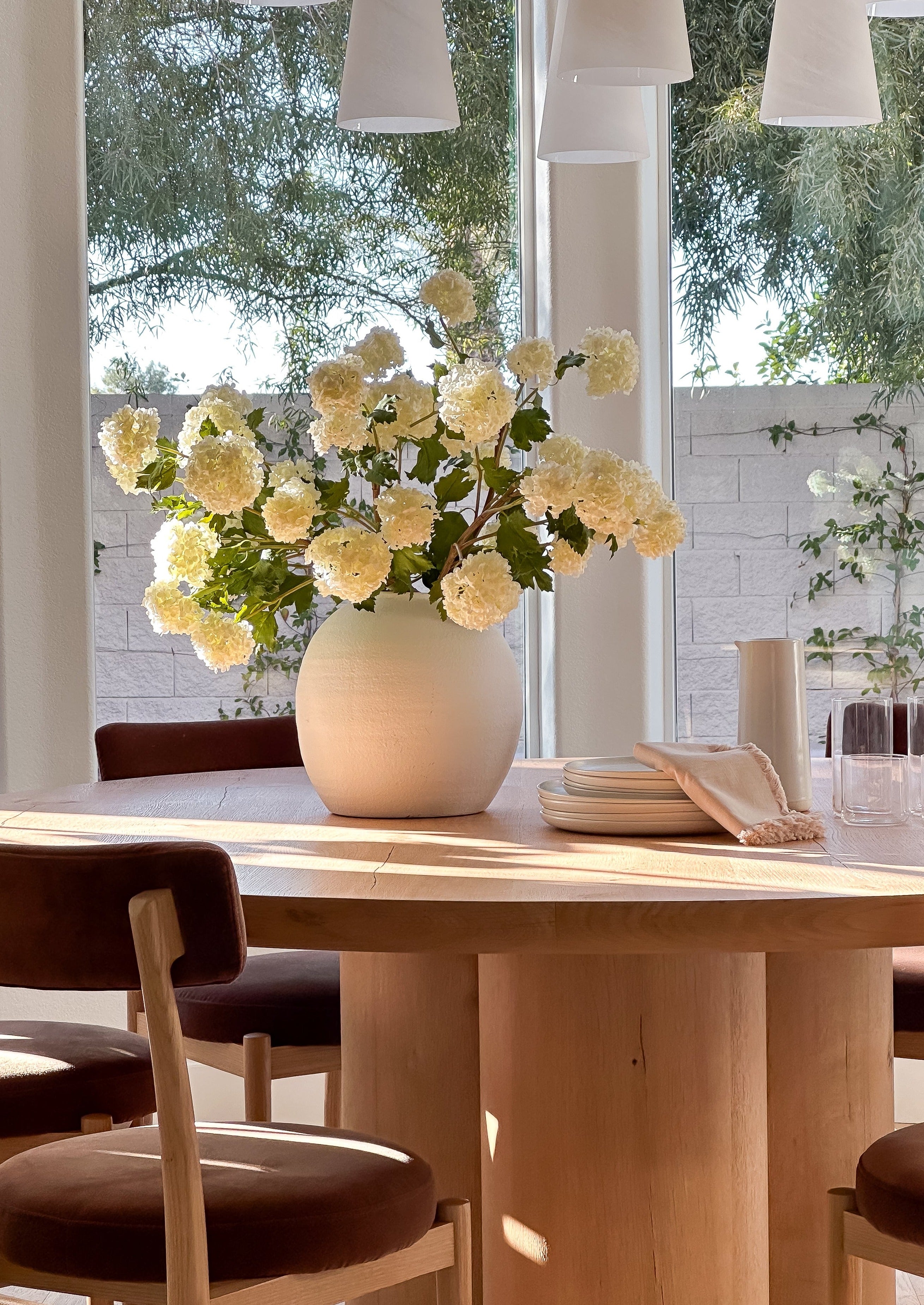 white flowers in white vase