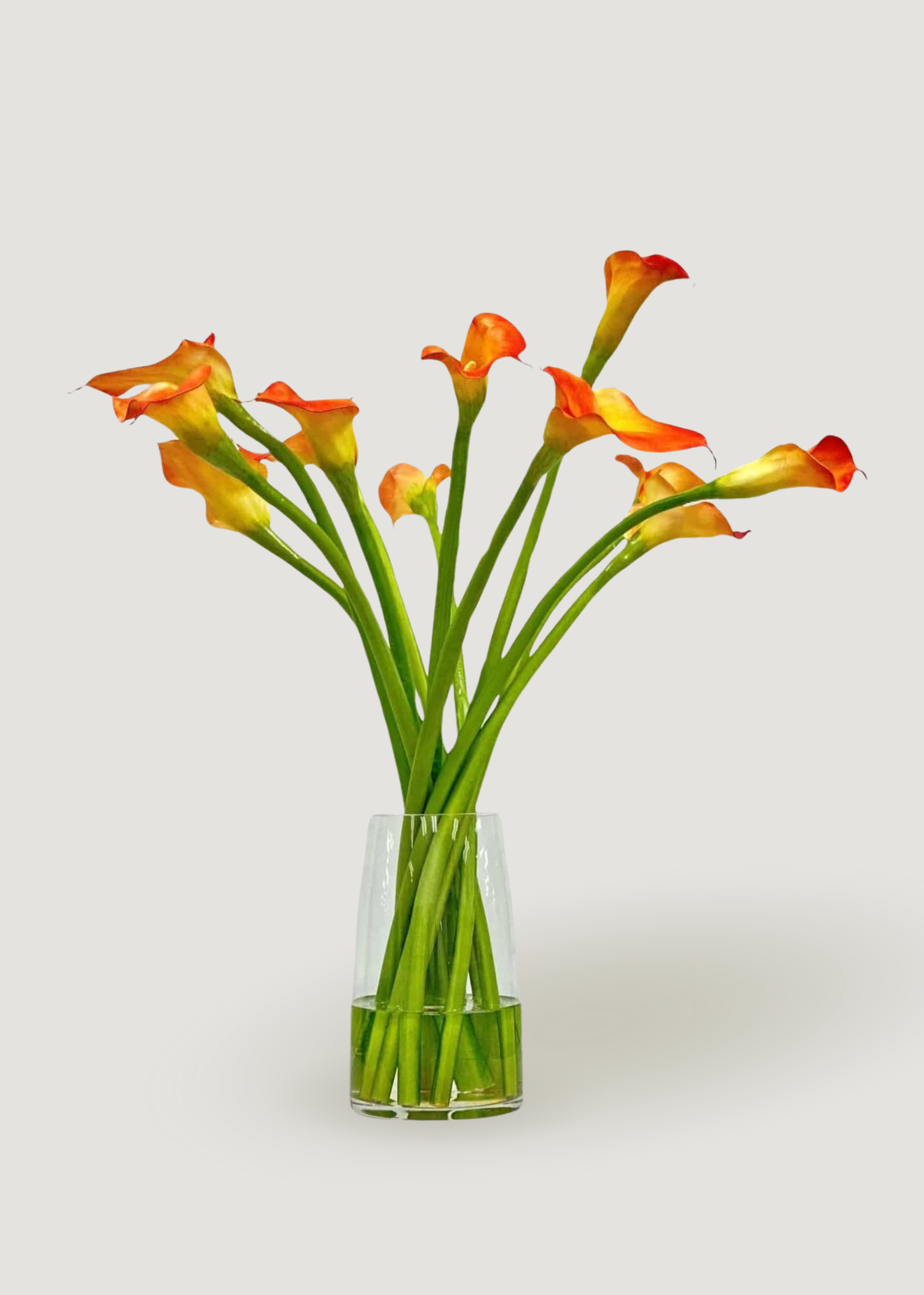 Orange Artificial Calla Lily Arrangement in Glass Vase