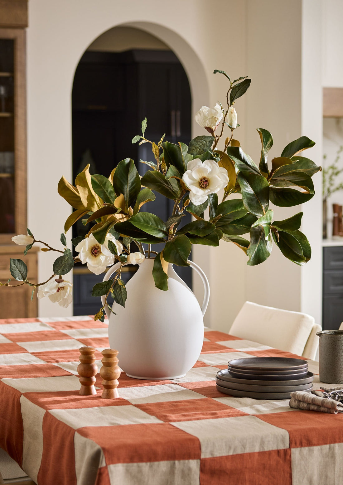 Checkered Tablecloth with Magnolia Arrangement