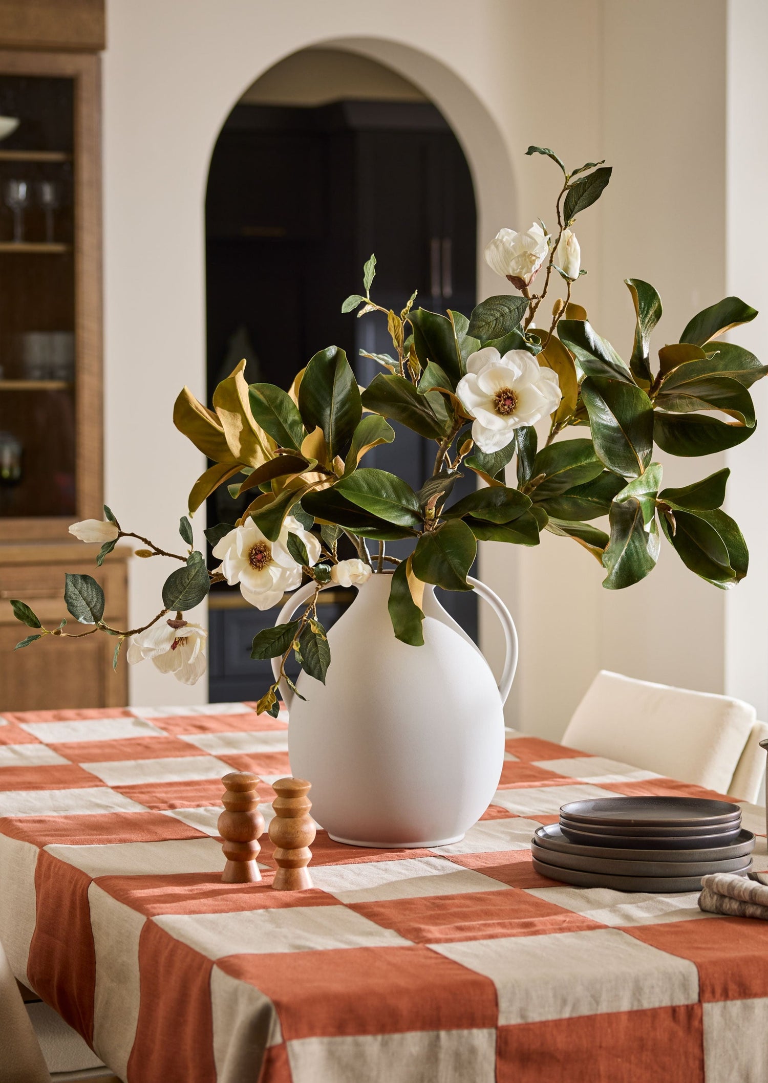 Clay Jug Vase with Magnolia Arrangement